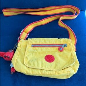 Kipling Yellow Crossbody Bag with Red Accents